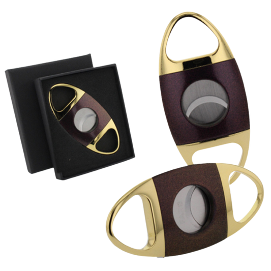 goud en bruine sigarenknipper in geschenkdoos